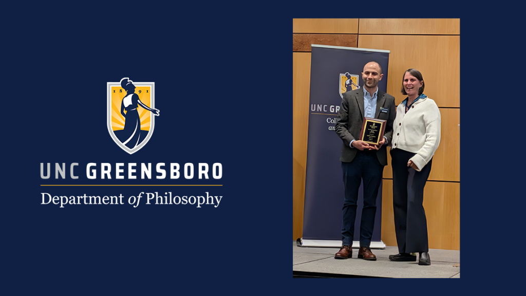 Dr. Jeffrey Kaplan receives his Excellence in Teaching Award at the CAS End of Year Celebration